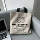 thumbnail image 2 of Sanrio-Bolso de hombro de Hello Kitty para mujer, bandolera informal de gran capacidad, con letras de lona, a la moda, Harajuku, con cremallera, 2 of 4