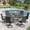 Black Table-Black Chairs, variant on VOXBIN 5 Pieces Patio Dining Set - 40.7" Round Metal Table and 4 Swivel Chairs, Sandshell Table and Sandshell Chairs