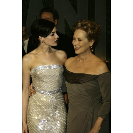 Anne Hathaway and Meryl Streep arriving at the Vanity Fair Oscar Party at Sunset Towers in Los Angeles Photo