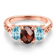 thumbnail image 3 of Gem Stone King 18K Rose Gold Plated Silver Red Garnet and Blue Zircon Filigree Style 3 Stone Ring for Women (2.83 Cttw, Oval 8X6MM and 6X4MM) (Size 7), 3 of 6