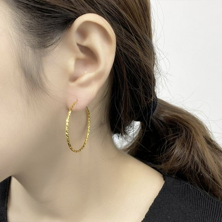 Spring loaded hoop earrings deals