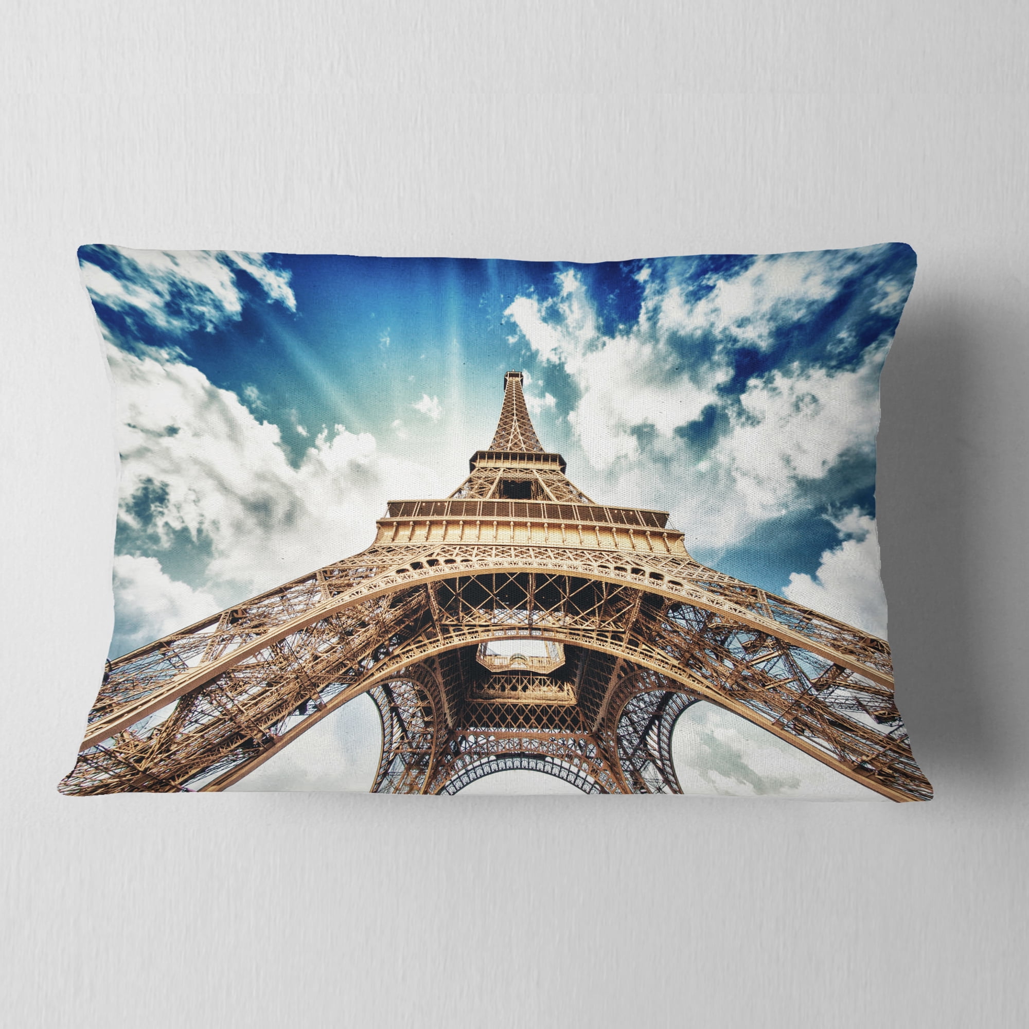 Designart Paris Eiffel Towerwith Fast Moving Clouds - Photography Throw Pillow - 12x20