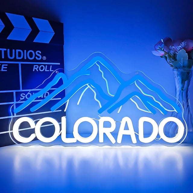 Letrero de pared de neón pintado con luz azul de las montañas de Colorado