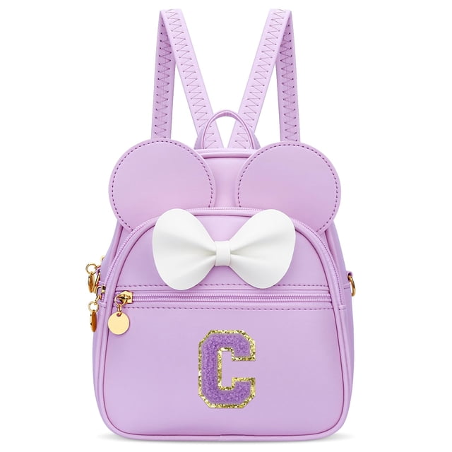 Minimochila KKXIU con iniciales en forma de lazo para niñas, piel sintética morada