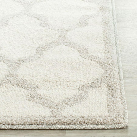 Safavieh AMHERST  BEIGE / LIGHT GREY  2 -3  X 11   Area Rug  AMT420E-211 AMHERST  BEIGE / LIGHT GREY  2 -3  X 11   Area Rug  AMT420E-211 Coordinate indoor and outdoor living spaces with fashion-right Amherst all-weather rugs by Safavieh. Power loomed of long-wearing polypropylene  beautiful cut pile Amherst rugs stand up to tough outdoor conditions with the aesthetics of indoor rugs. - Backing: No Backing - Color: BEIGE / LIGHT GREY - Shape: Runner - Size: 2 -3  X 11  - Weight: 10 - Construction: Power Loomed - Pile Height: 0.39 - Fiber/Finish: 67% Polypropylene 18% Fibrillated Polypropylene 8% Latex 7% Poly-cotton(warp)