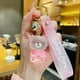 thumbnail image 1 of Llavero con colgante de resina con forma de oso de cristal para coche, diseño creativo de dibujos animados, muñeco con personalidad, bolsa con campana, regalo pequeño, 1 of 6