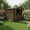 Brown, variant on Mintazer 6×9ft Modern Metal Outdoor Storage Shed with Windows & Lockable Doors, Waterproof Weatherproof Garden Shed for Backyard Patio, Gray