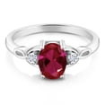 thumbnail image 2 of Gem Stone King 925 Sterling Silver Red Created Ruby and White Moissanite 3-Stone Rings for Women (1.43 Cttw, Gemstone July Birthstone, Oval 8X6MM, Available in Size 5, 6, 7, 8, 9), 2 of 4