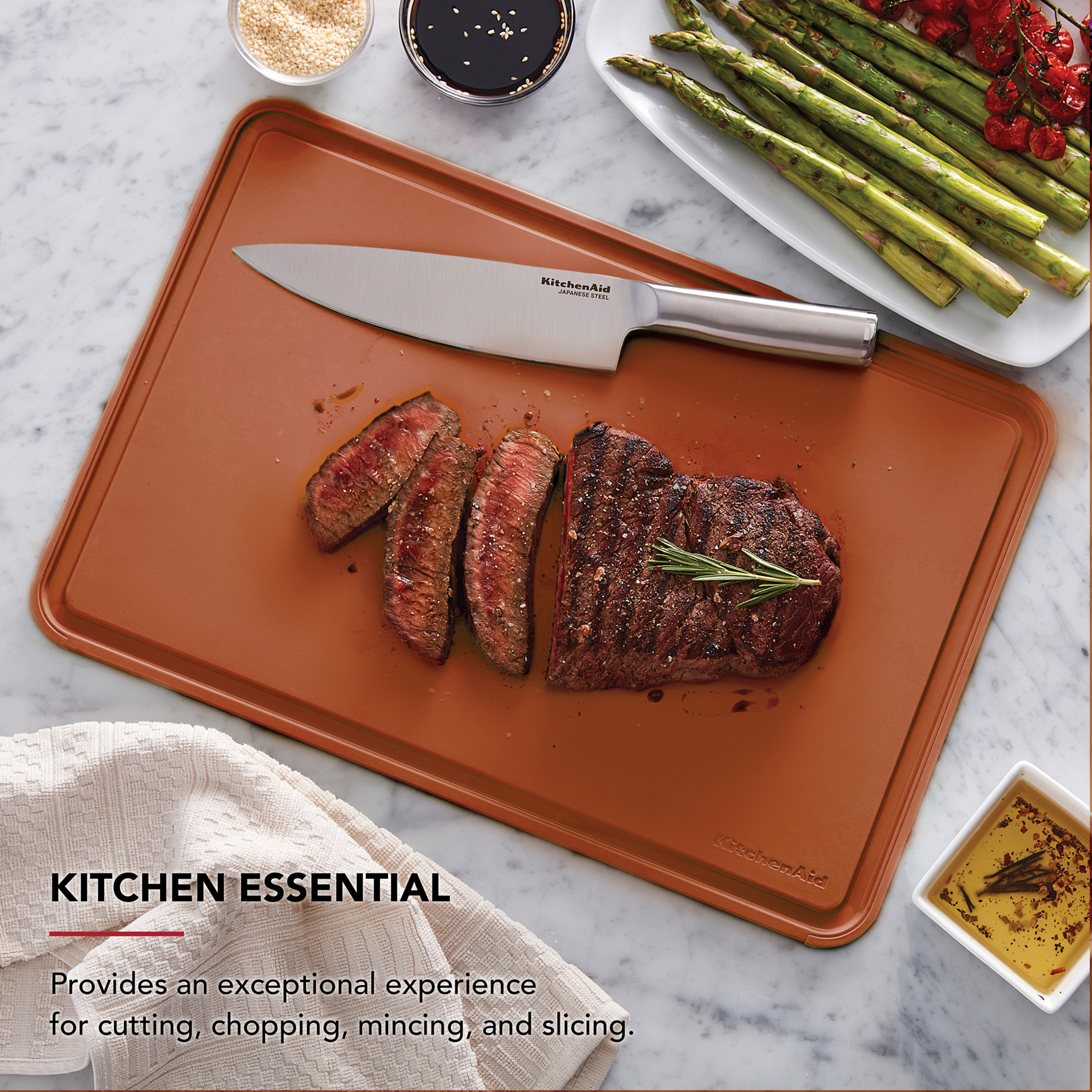 KitchenAid Classic Plastic Cutting Board with Trench, Non-Slip Edges, Dishwasher Safe, 12x18, Scorched Orange
