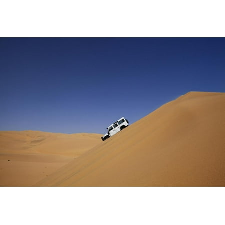 Car Descending a Sand Dune, Namib-Naukluft National Park, Namibia Print Wall Art By David