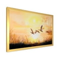 thumbnail image 2 of Designart 'Three Cranes Flying Through Warm Sunset' Traditional Framed Art Print, 2 of 4