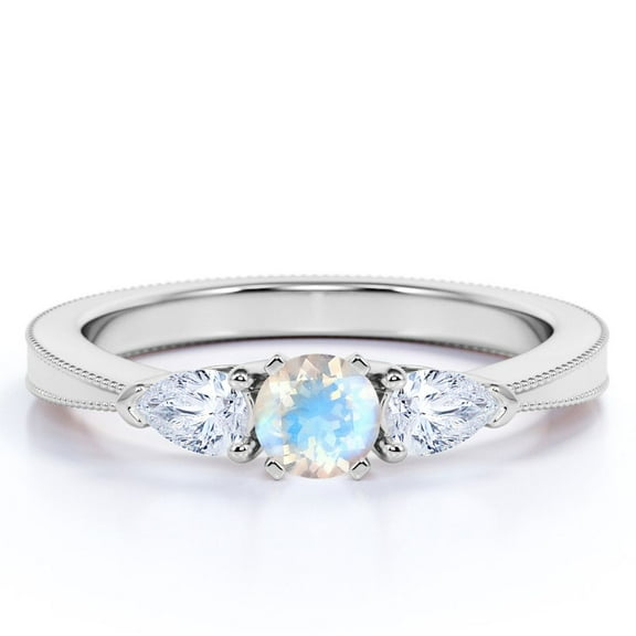 JeenMata 1.5 carat Round Cut Moonstone and Moissanite Curved Shoulder Engagement Ring in 18k White Gold over Silver