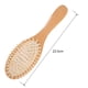 thumbnail image 4 of Peine de madera de Higo con almohadilla de aire para masaje capilar, diseño ergonómico y púas negras circulares. Ideal para cuidado del cabello y reducción de estática., 4 of 6