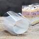 thumbnail image 2 of Rollos de pastel transparente Cinta de acetato Hojas de papel de círculo de pastelería Película de revestimiento transparente para decoración de pasteles de mousse de chocolate (10 m * 10 cm) Afortunado Sencillez, 2 of 2