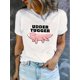 thumbnail image 1 of Women's Casual Graphic Tee - "UDDER TUGGER" Pig Leg Print, White Crew Neck Short Sleeve, Lightweight Polyester Blend, Comfortable Summer Top for Casual Attire, Ladies T Shirts, 1 of 6