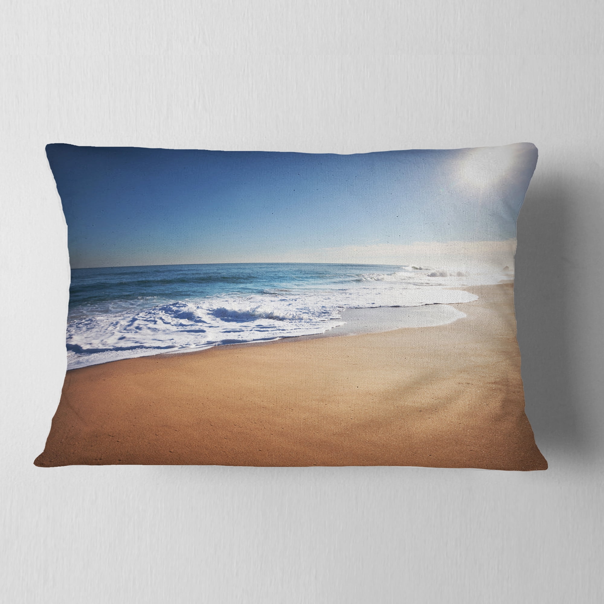 Designart Calm Blue Seashore with White Sun - Seashore Throw Pillow - 12x20