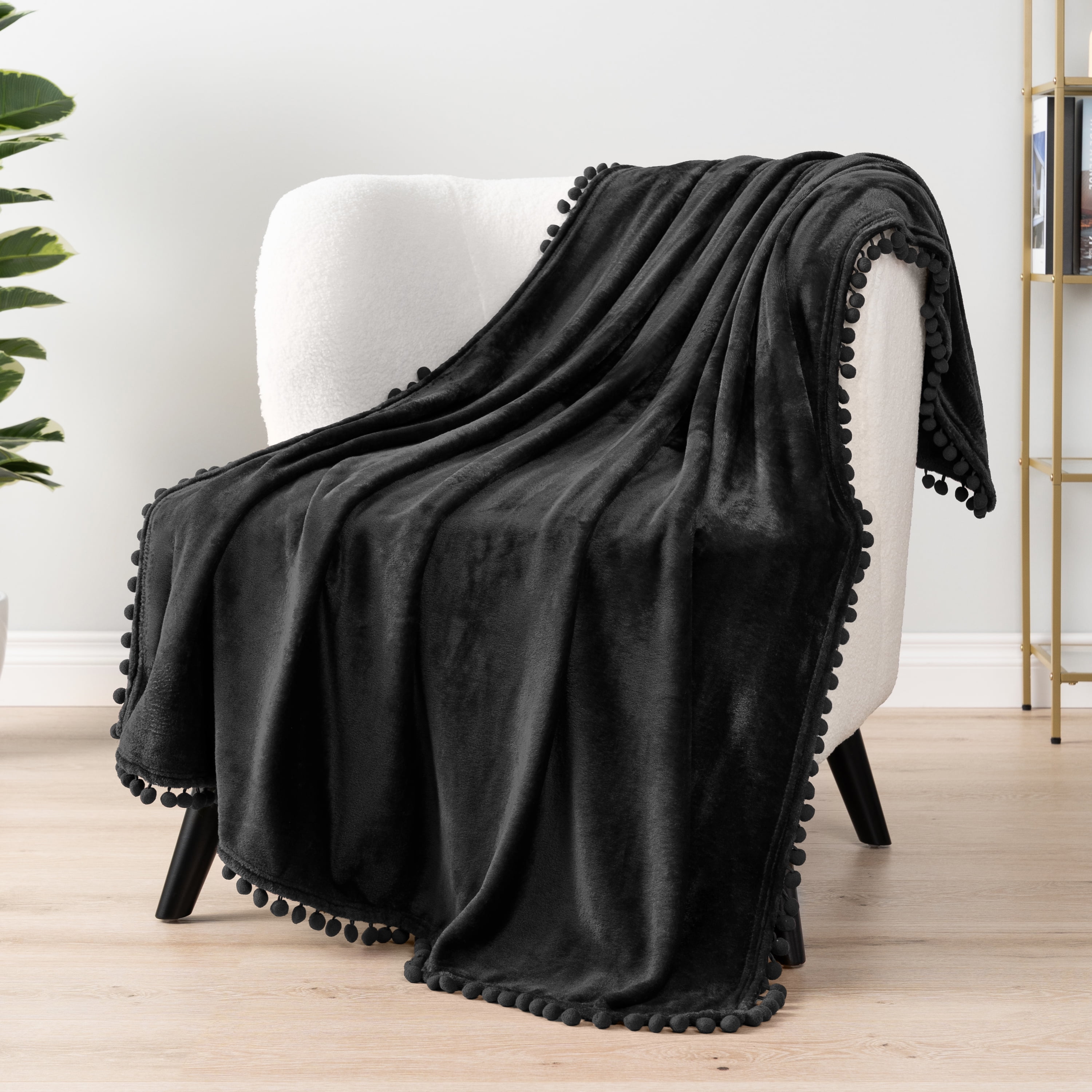 PAVILIA Fleece Throw Blanket for Couch with Pom Pom Fringe, Black, Soft Cozy Fuzzy Flannel Blanket for Sofa Bed, Large Lightweight Plush All Season Throw, 60x80 Inches