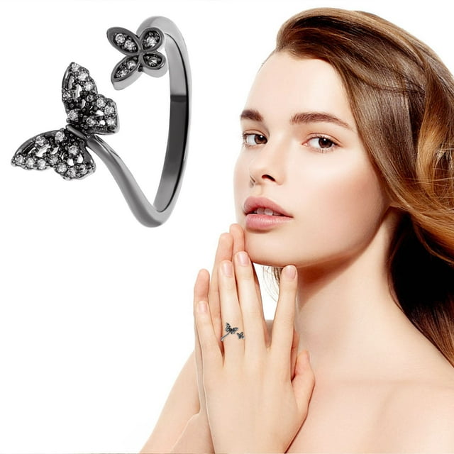 Up to 65% Off Butterfly Ring Personality Full Diamond Butterfly Geometric Metal Open Ring Jewelry. This stylish ring features a geometric open design with two butterfly motifs adorned with sparkling diamonds, perfect for engagements, weddings, anniversaries, or casual wear. Ideal as a gift for women, it is part of a versatile jewelry set. Shown on a hand for scale and style inspiration.