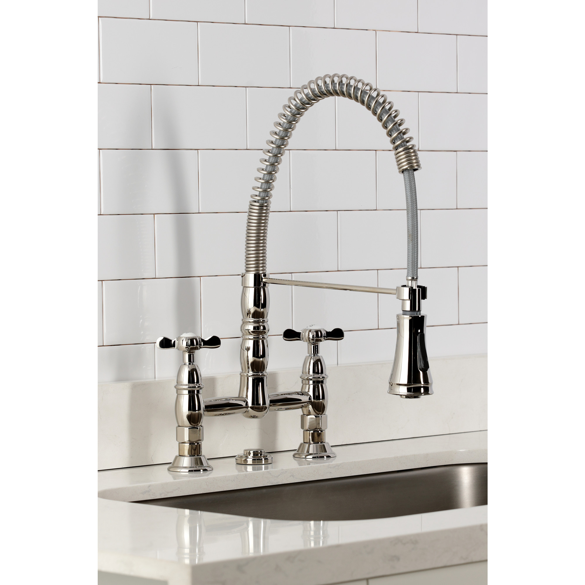 Kingston Brass GS1276BEX Essex Double-Handle 2-Hole Deck-Mount Pre-Rinse Bridge Kitchen Faucet in Polished Nickel