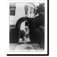 thumbnail image 2 of Historic Framed Print, [Mrs. Herbert Hoover, full-length portrait, standing, facing left; with German shepherd dog, under arch of hedge outside the White House], 17-7/8" x 21-7/8", 2 of 9