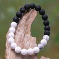 thumbnail image 4 of NOVICA Handmade Ceramic Lava Stone Beaded Stretch Bracelet from Bali No Black White Indonesia [6.25 in Inner Circ. x 0.3 in W] 'Mesmerizing Contrast', 4 of 7