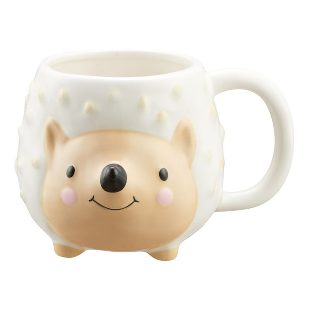 Ceramic mug shaped like a smiling porcupine in white and beige with textured spines, 17.25 oz capacity.