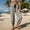 Black, variant on Women's High-Waist Wide-Leg Pants, Single Button Waistband, Central Pleats and Textured Details for Busy Daily Urban Commutes Black S
