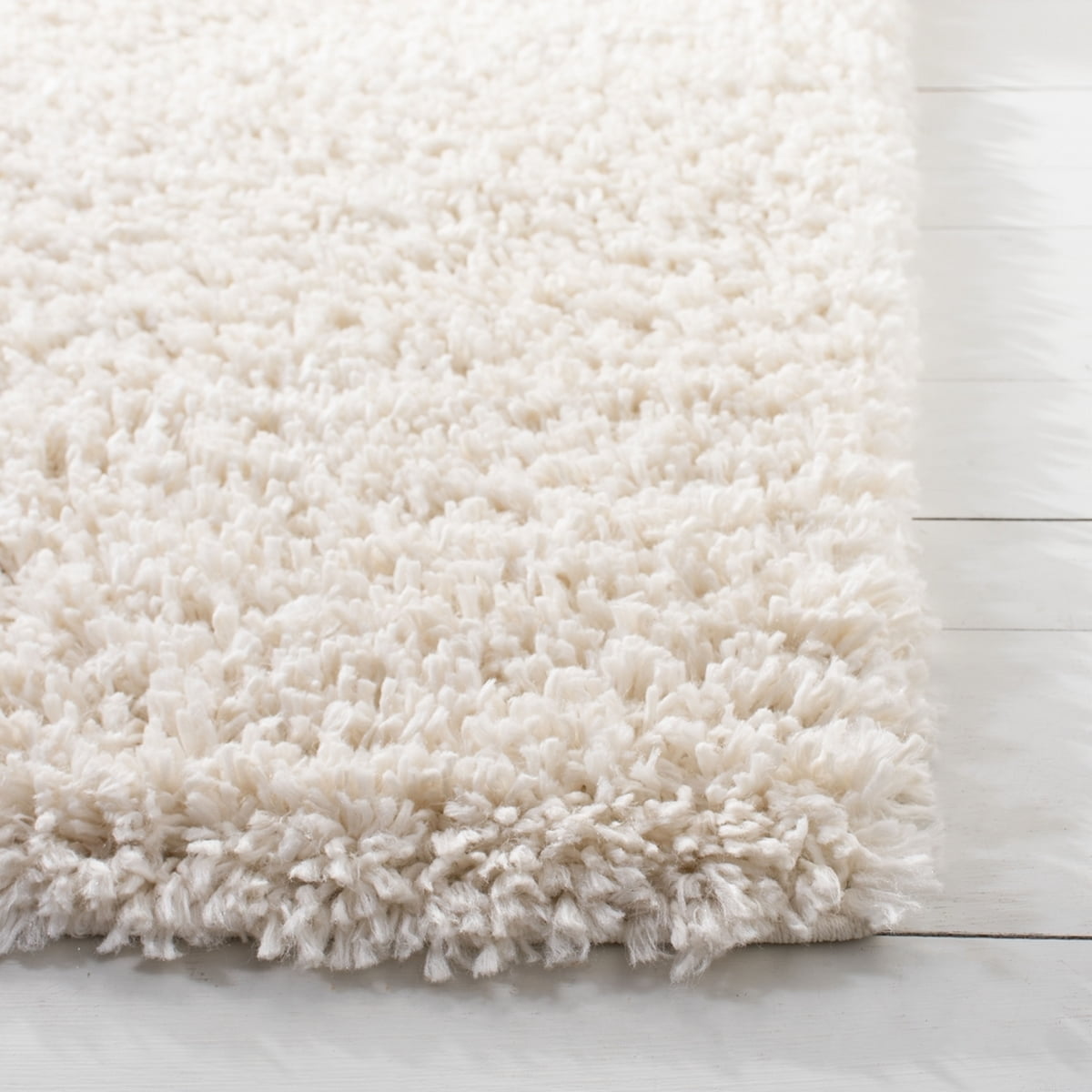 SAFAVIEH August Sophia Solid Plush Shag Area Rug, Ivory, 5'3" x 7'6"