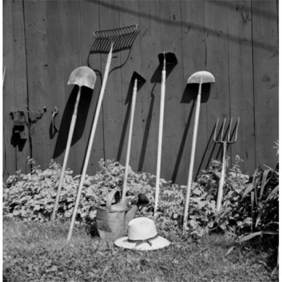 Posterazzi SAL255424685 Close Up of Gardening Tools Leaning Against Wall Poster Print - 18 x 24 in.