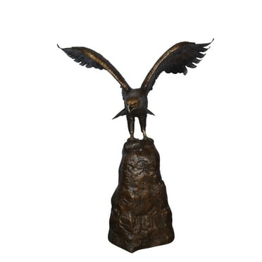 Eagle Landing on a Rock Bronze Statue - Size: 51"L x 36"W x 58"H.