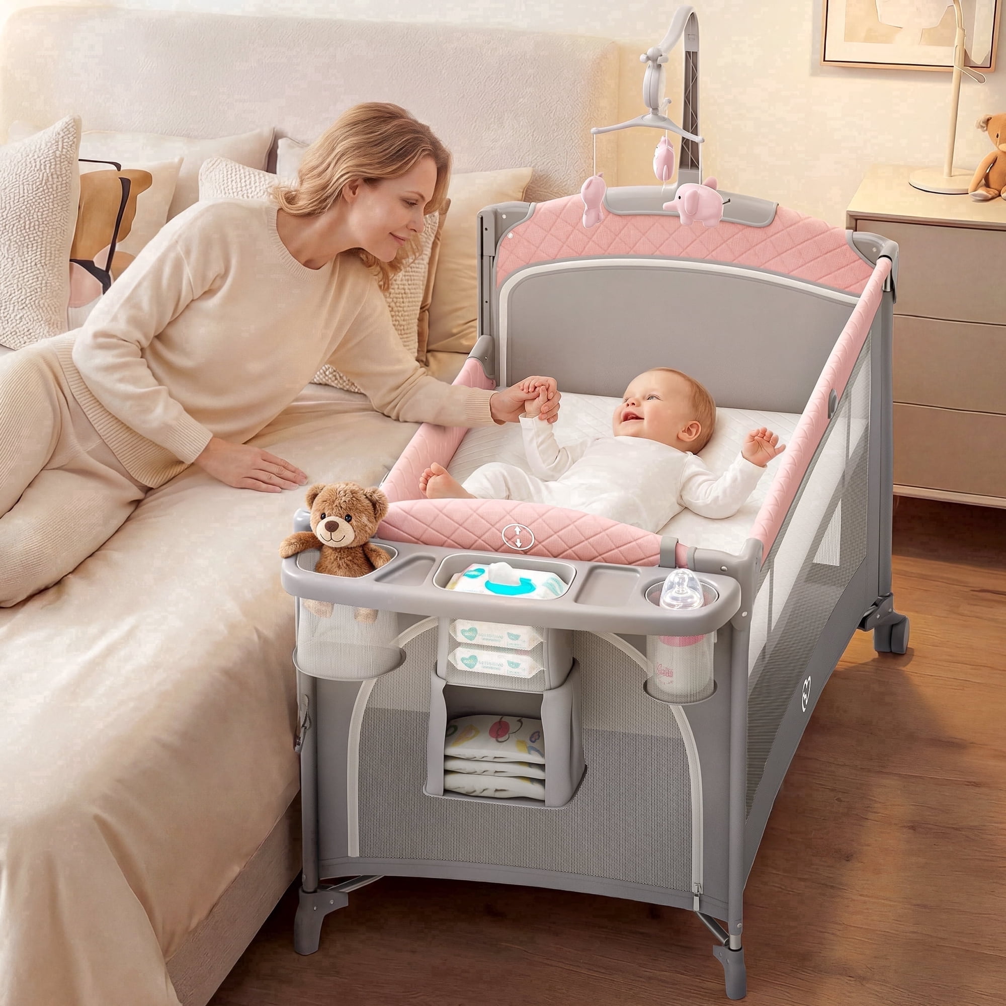 Babyomi 5 in 1 Pack and Play Easy Folding Portable Playards, Baby Bassinet with Mattress, Diaper Changer and Music Mobile Pink