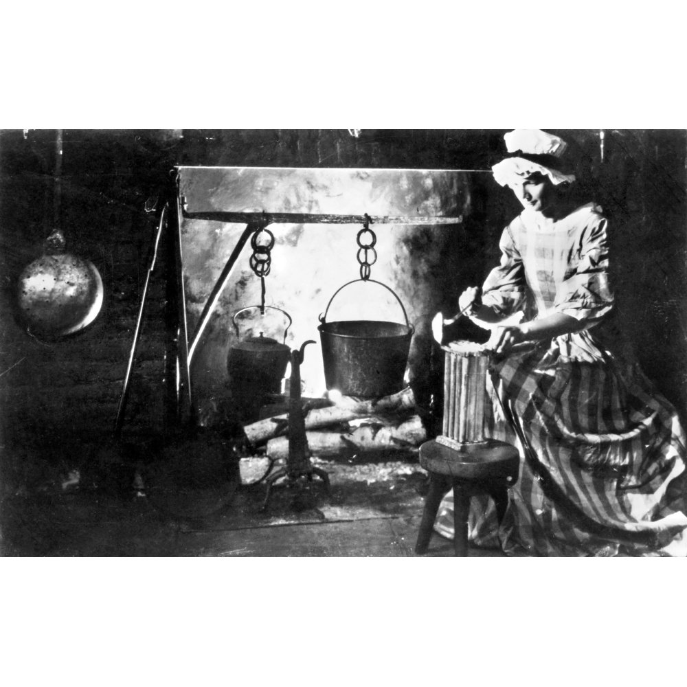 Colonial CandleMaking Nan Actor Making Candles In A Representation Of