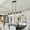 Black, variant on ACE-LIGHTS,Modern Industrial 5-Light Chandelier with Clear Glass Shades(Bulbs Not Included),Hanging Ceiling Light Fixture for Living Room,Dining Room,Kitchen Island(Black)