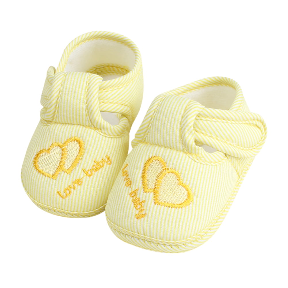 yellow infant shoes