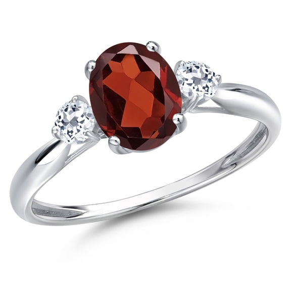 Gem Stone King 10K White Gold Red Garnet and White Topaz 3-Stone Ring for Women | 1.78 Cttw | Oval 8X6MM | Gemstone January Birthstone | Size 8