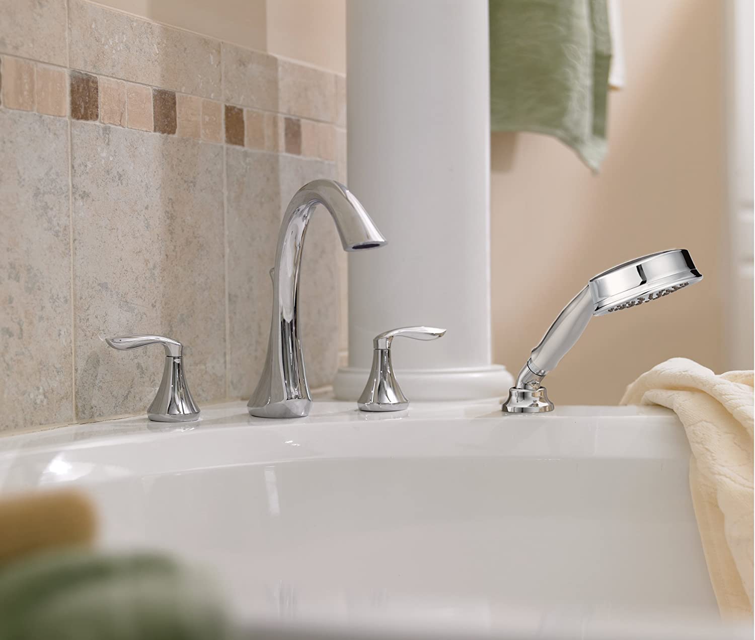 Moen T944 Chrome two-handle roman tub faucet includes hand shower