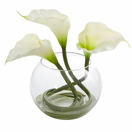 Calla Artificial Lilies Floral Arrangement in Vase  Flower Type: Artificial  Overall Product Weight: 2 lb. AT A GLANCE 1. Container Included: Yes Three artificial calla lily blooms rise out of the rounded glass vase. Inside  their stems swirl together into the faux water. This product has been carefully crafted for realism and beauty. Use it as a floral arrangement for your next dinner party surrounded by flickering tea lights. OVERALL DIMENSION 1. Overall: 9     H x 6     W x 6     D FEATURES 1. Made with care from finest materials 2. Product may ship compressed - Primping of branches or leaves may be required to match the image shown WEIGHTS & DIMENSIONS 1. Overall: 9     H x 6     W x 6     D 2. Vase: 5.75     D x 5.75     W 3. Overall Product Weight: 2 lb. 4. Base Height - Top to Bottom: 6 FEATURES 1. Flower Type: Artificial 2. Arrangement Type: Floral Arrangements and Centerpieces 3. Flower Species: Lilies 4. Flower Material: Plastic; Fabric; Faux Silk; Polyester 5. Container Included: Yes 6. Container Color: Clear 7. Container Type: Vase 8. Container Material: Glass 9. Pieces Included: Plant & Vase 10. Product Care: Wipe clean with a dry cloth 11. Supplier Intended and Approved Use: Non Residential Use; Residential Use 12. Country of Origin: Made in USA of Imported Materials WARRANTY 1. Commercial Warranty: No You may also like following products 1. Phalaenopsis Orchid with Succulents Floral Arrangement in Pot  Arrangement Type: Floral Arrangements and Centerpieces  Flower Species: Orchid 2. Metallic Spiral Cones Hydrangeas Floral Arrangement in Vase  Metallic finish  Flower Species: Hydrangea 3. Hydrangea Floral Arrangement in Vase  Product may ship compressed - Primping of branches or leaves may be required to match the image shown  Vase: 6     D x 6     W 4. Peony Bouquet Floral Arrangement  Product Care: Indoor Use Only  Overall Product Weight: 0.6 lb. 5. Calla Lily Hydrangea and Orchid Centerpiece in Decorative Vase  Flower Species: Hydrangea; Orchids  Overall: 19     H x 20     W x 13     D