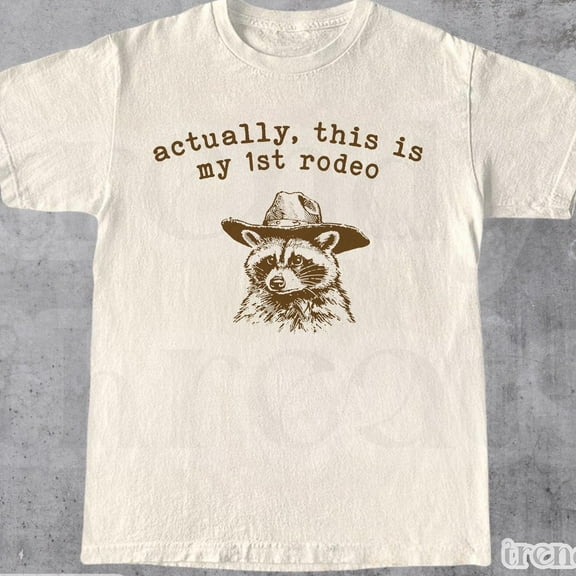 DOPASHIRT Actually, This Is My First Rodeo T-Shirt | Funny Western Graphic Tee | Animal Quote | Retro Shirt Unique Gift Idea | Unisex Shirt Unisex S-5XL Hot Trending Shirt, Vintage Birthday Gift