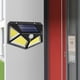 thumbnail image 3 of Paquete de 4 luces solares para exteriores FloreceBien, luz de seguridad para pared con mejora del ángulo de iluminación, 3 of 5