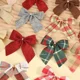 thumbnail image 2 of 24/5 piezas Lazos navideños Adornos navideños Lazos dorados y rojos Adornos para árbol de Navidad Decoraciones de Año Nuevo 2025 Mini lazos Papel de regalo, 2 of 5