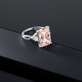 thumbnail image 4 of Gem Stone King 10K White Gold Peach Nano Morganite and White Moissanite 3 Stone Engagement Ring for Women (6.76 Cttw, Emerald Cut 14X10MM, Trillion 4MM, Size 6), 4 of 5