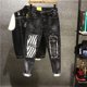 thumbnail image 2 of Pantalones vaqueros negros para hombre, con estampado gráfico, con agujeros, rotos, rasgados, estilo grunge, Y2k, estilo Harajuku, elásticos, para verano, tallas XS, 2 of 4