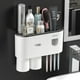 thumbnail image 1 of Organizador de baño Pasta de dientes Dispensador automático Soporte de cepillo de dientes Montado en la pared, Soporte de cepillo de dientes multifuncional Estante de almacenamiento/gris, 1 of 5