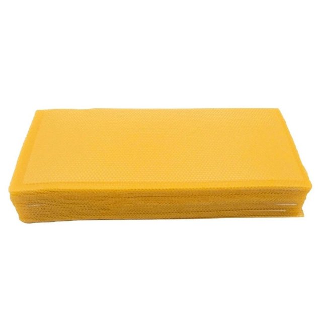 A stack of 30 yellow honeycomb foundation bee wax sheets, measuring 13 x 9 cm, designed for beekeeping and candlemaking. Made from beeswax, these sheets are essential for beekeepers, promoting fast nesting and high honey production. Each sheet is separated by protective paper to prevent interaction. Suitable for use in beehive frames and other beekeeping tools.