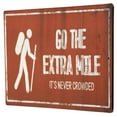 Go The Extra Mile Rustic Embossed Metal Sign