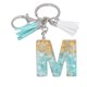 thumbnail image 1 of Llavero de letras con borlas verdes | Colgante de cristal acrílico | Lámina de oro, pegamento en gota, joyería de piedra engrosada | Amuleto de bolso con estilo, accesorio para mochila | 1 pieza, 1 of 2