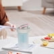 thumbnail image 5 of Botella Agitadora de Proteínas 300ml | Vaso de agua de plástico de mano con escala y agitador incorporado | Tapa abatible a prueba de fugas | Boca ancha fácil de limpiar | Mezclador portátil de, 5 of 5