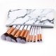 thumbnail image 1 of Juego profesional de brochas de maquillaje QUANZHOUTIANDI 10 brochas bolsa de cosméticos mármol, 1 of 5