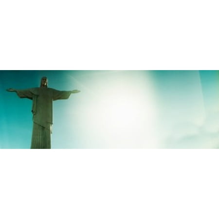 Redeemer Light - Low angle view of Christ The Redeemer Corcovado Rio de Janeiro Brazil Poster Print