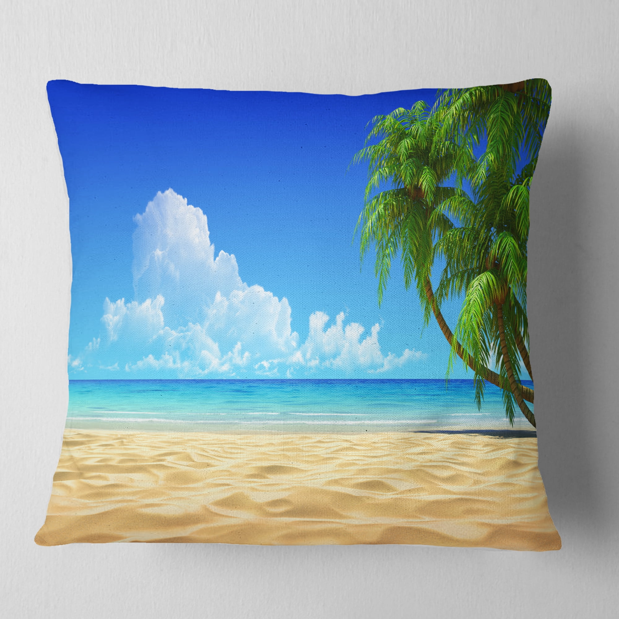 Designart Coconut Palms Bent into Beach - Seashore Throw Pillow - 18x18